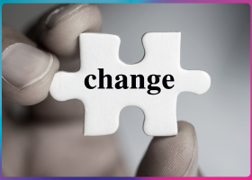 image of man holding a jigsaw piece with the words change on it